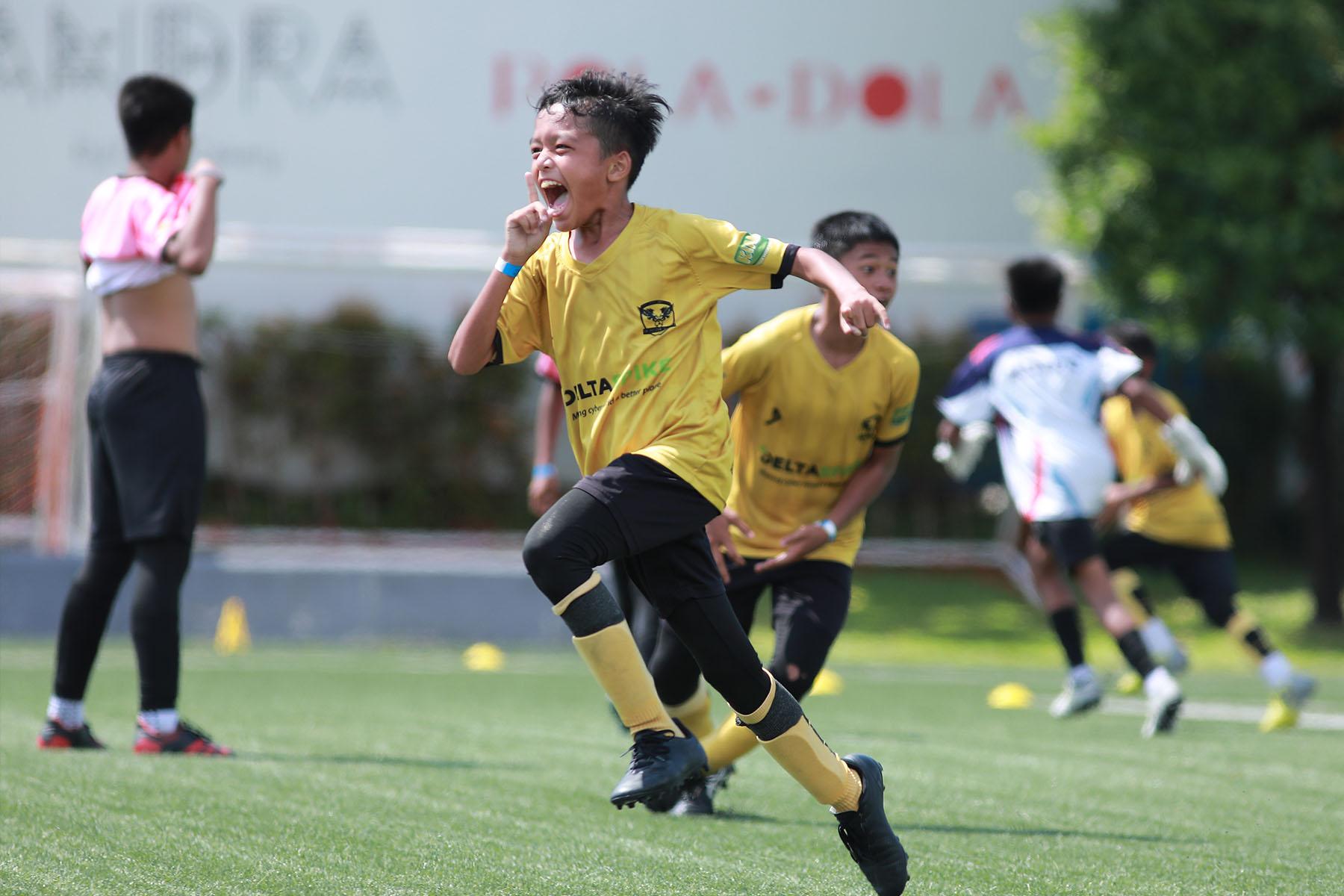 Young football player in action